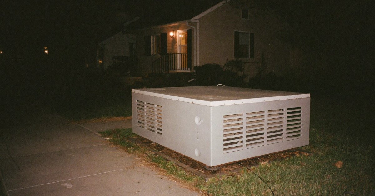 House with power from a standby generator during a night outage