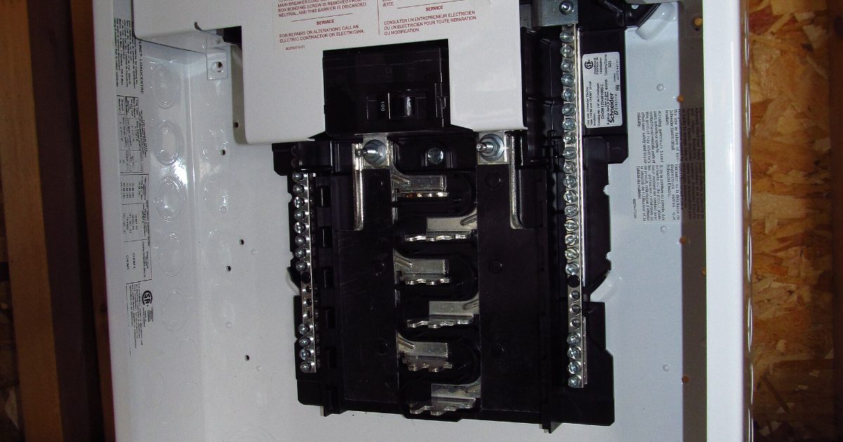 Residential circuit breaker panel where an interlock kit is installed